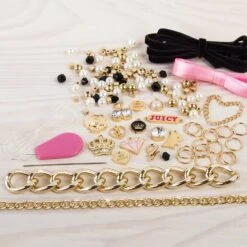 Make It Real - Juicy Couture Chains And Charms - DIY Charm Bracelet Making Kit For Girls - Feature Beads, Velvet Ribbon, Gold Chains -Cuddle House Toys Shop 7d38cb0afc75167496ea2cdd46a9f8a7
