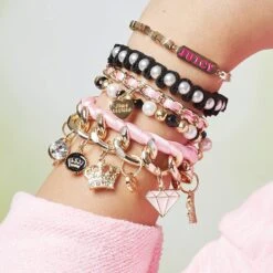 Make It Real - Juicy Couture Chains And Charms - DIY Charm Bracelet Making Kit For Girls - Feature Beads, Velvet Ribbon, Gold Chains -Cuddle House Toys Shop 7e761530e8268505c5f4e16a1aace7ee