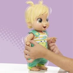 Baby Alive Baby Gotta Bounce Doll, Frog Outfit, Bounces With 25+ SFX And Giggles, Drinks And Wets, Blonde Hair Toy For Kids Ages 3 And Up 10 Baby Alive Baby Gotta Bounce Doll, Frog Outfit, Bounces With 25+ SFX And Giggles, Drinks And Wets, Blonde Hair Toy For Kids Ages 3 And Up -Cuddle House Toys Shop BabyAliveBabyGottaBounceDoll Frog Bounceswith25 SFX3