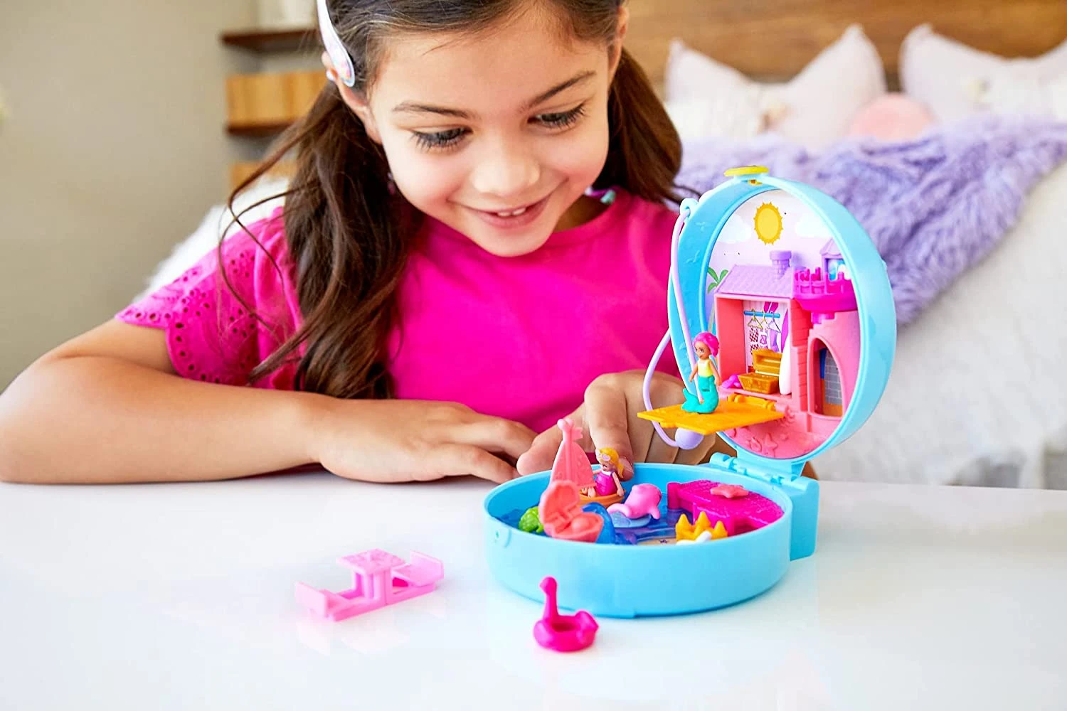 Polly Pocket Dolphin Beach Compact, Beach-Adventure Theme With Micro Polly & Mermaid Doll, 5 Reveals & 13 Accessories, Pop & Swap Feature 2 Polly Pocket Dolphin Beach Compact, Beach-Adventure Theme With Micro Polly & Mermaid Doll, 5 Reveals & 13 Accessories, Pop & Swap Feature - Image 2